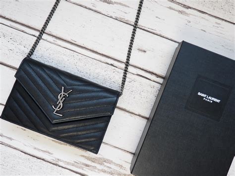 ysl woc价钱|Bag Review: Yves Saint Laurent Monogram Wallet On .